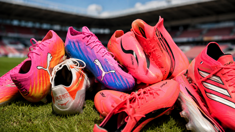 Why are footballers wearing pink boots at the World Cup?